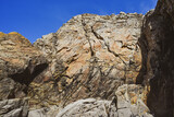 Fototapeta Desenie - .Rocky ocean coast in France, beautiful rock blocks.