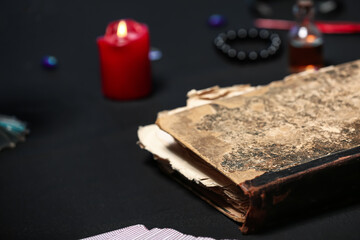 Old spell book on table