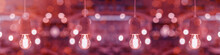 Pendant Light Concrete Gray - Light Bulbs In Concrete Socket Hang From The Ceiling In A Living Room, With Pink Red Abstract Bokeh Lights