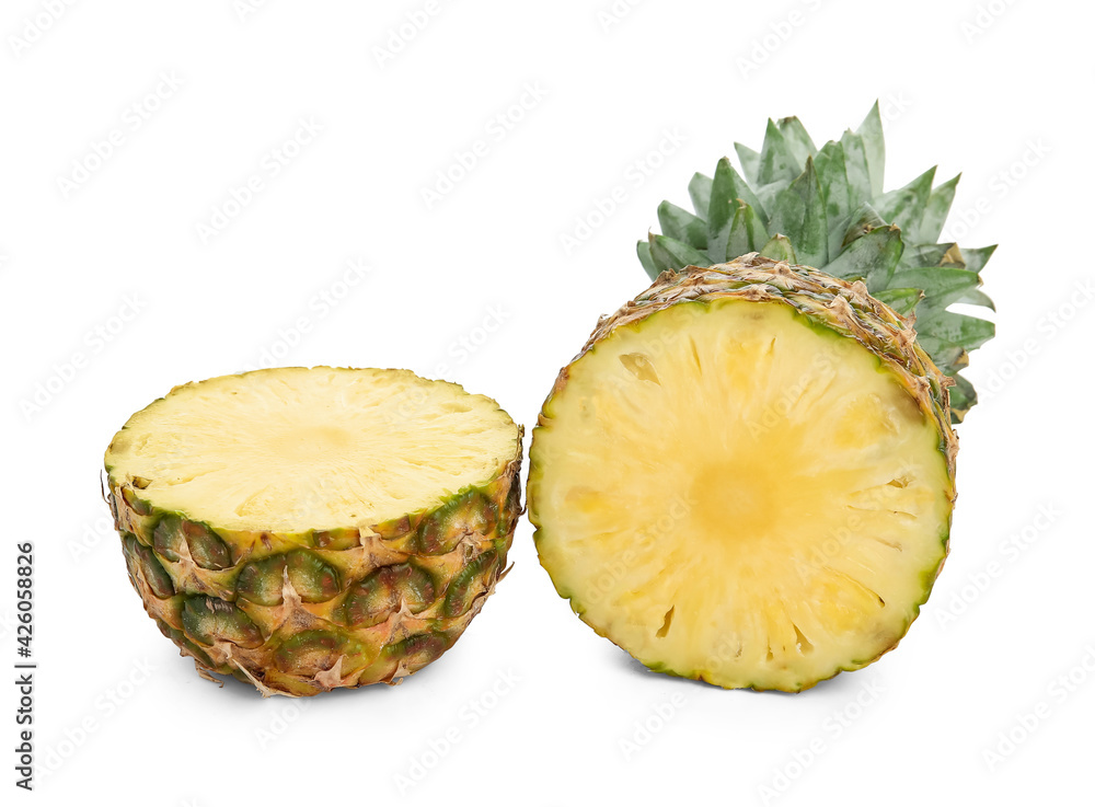 Cut fresh pineapple on white background