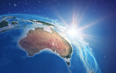 Canvas Print - sunrise through clouds, upon a high detailed satellite view of planet earth, focused on australia. 3