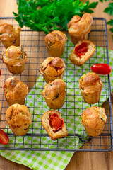 Wall Mural - Savoury vegetable muffins with cherry tomatoes