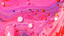 Top View Of Colorful Vibrant Rocks On Purple Background For Wallpapers And Banners