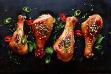 Roasted Spicy Chicken Legs. Top View With Copy Space.