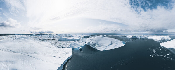 iceberg and ice from glacier in arctic nature landscape in ilulissat,greenland. aerial drone photo o