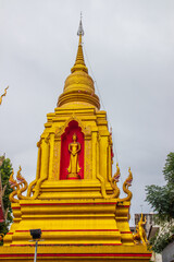 Poster - Vertical shot of the temple of Wat Mung Muang in Chiang Rai, Thailand