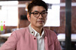 © Wavebreak Media - Portrait of stylish asian businessman looking to camera