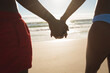 © Wavebreak Media - Midsection of african american couple in love holding hands