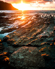 Sunset, Rocks And Beach In Costa Rica