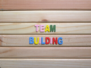 Words Team building on wood background