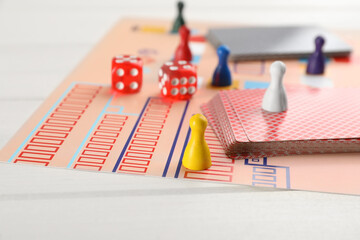 Sticker - Board game on white wooden table, closeup