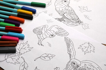 Poster - Drawings for coloring and felt tip pens on table, closeup