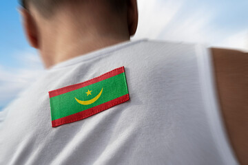 The national flag of Mauritania on the athlete's back