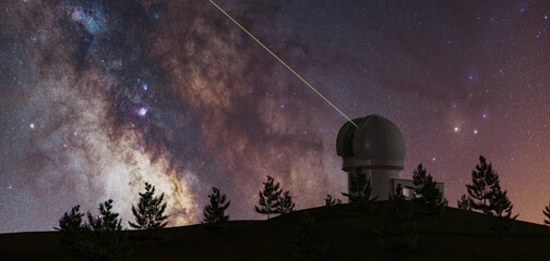 milky way with large telescope on the horizon and pine trees