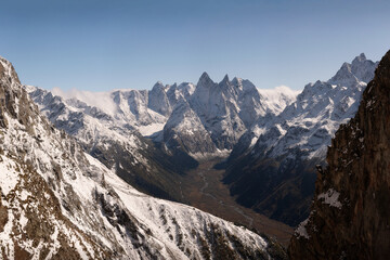 Poster - Early spring Gonachkhira gorge with Chotcha mountain range, mountain peaks covered with snow.