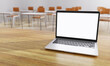 © Shutter2U - Close up of white isolated cut out laptop monitor display with classroom background. Education and telecommunication learning and lecture concept. Social distancing theme. 3D illustration rendering