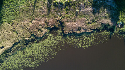 Wall Mural - Aerial view of Saldus lake and boats, Latvia