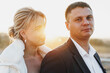 © fotofabrika - Portrait of a bride and groom in a sunset light