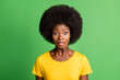 © deagreez - Photo of shocked young afro american woman wear yellow t-shirt stare isolated on green color background