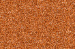 Orange glitter background. Orange confetti. Seamless vector illustration.
