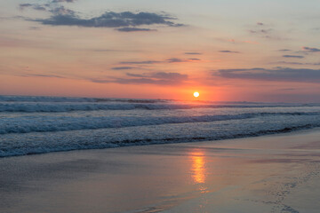 Wall Mural - Beautiful sunset sky on the beach in Matapalo, Costa Rica. Central America. Sky background on sunset. Tropical sea.