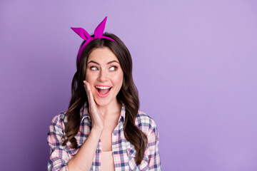 Sticker - Photo portrait of astonished girl touching face with one hand looking at blank space isolated on vivid purple colored background