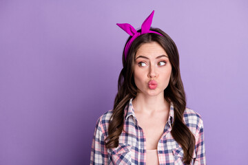 Wall Mural - Photo portrait of impressed pouting girl looking at blank space isolated on vivid purple colored background