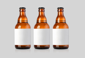 Wall Mural - three beer brown glass bottle