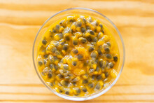 Close On Passion Fruit Pulp In Glass Bowl