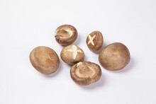 Closeup Shot Of Shiitake Mushrooms Isolated On White Background