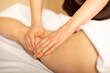 © Arina - Closeup photo of the anticellulite massage by a physiotherapist. Young girl is relaxing in the spa. Foot massage.