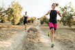 © Antonio Recena - Triathletes in olive groves compete by running in an olive grove