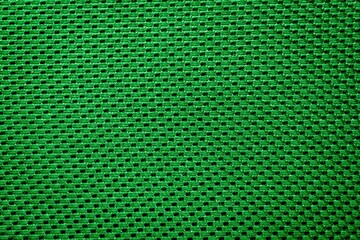 Wall Mural - green fabric with a visible texture. background