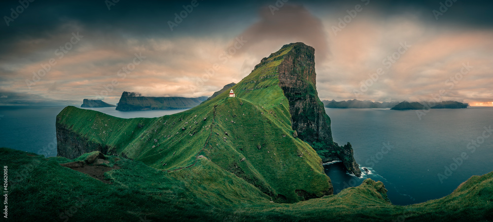 Panorama at Lighthouse with steep cliffs during sunset on Faroese island Kalsoy, Faroe Islands. - obrazy, fototapety, plakaty 