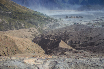 The soil of Mount Bromo active volcano at Bromo Tengger Semeru National Park, close up of rocks structure, made from volcanic ash, lava and other geologic materials