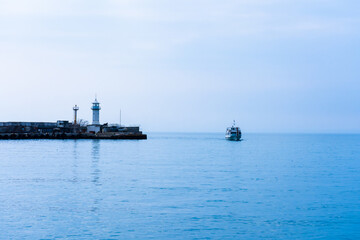 Wall Mural - The pleasure ship returns to port in the early morning