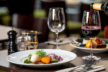 lojrom (whitefish roe) swedish dish served at the restaurant with wine