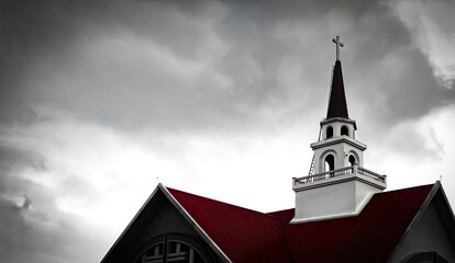 A church with a pinnacle in the heart of the city