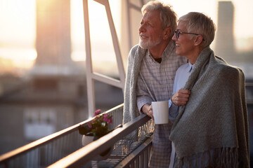 Happy senior couple enjoying morning together