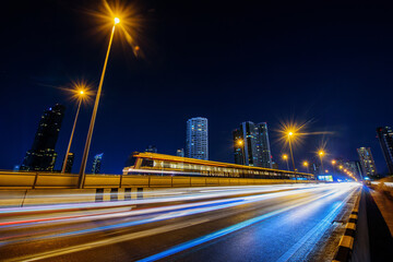 Long exposure shutter speed of car moving in road