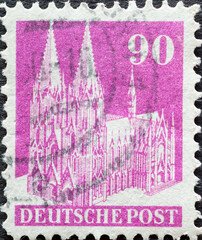 Wall Mural - GERMANY - CIRCA 1948: a postage stamp from Germany, showing the historic building of Cologne Cathedral.