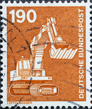 GERMANY - CIRCA 1982 : A Postage Stamp From Germany, Showing A Motif From Industry And Technology. Backhoe