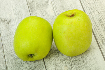 Two ripe green sweet apples