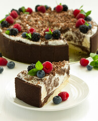 Wall Mural - Chocolate cake with fresh berries.