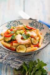 Poster - pasta with shrimp zucchinis tomato and green peas