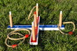 © Rusana - Quoits is a coloured rope quoit tossing game hoping to land on wooden peg worth points Players total their score and highest wins Opponents might count-down from 1000 improving maths and mental skills