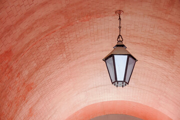 Street lamp, brick arch