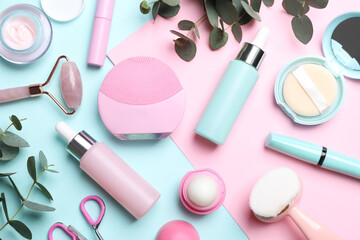 Flat lay composition with different skin care and makeup products on color background