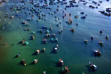 Fishing Boats In A Harbor During A Sunny Day, Aerial View