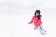 © warasit - Happy girl plays with a snow in sunny winter day